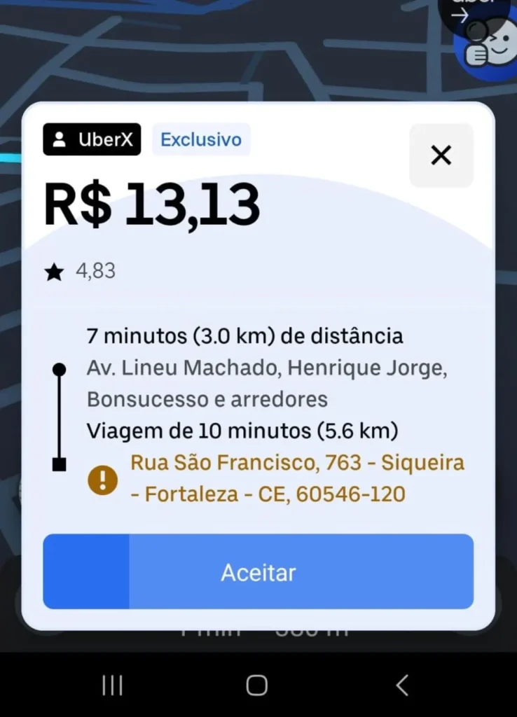 print screen da tela de um motorista de aplicativo com o destino do passageiro grifado em laranja.